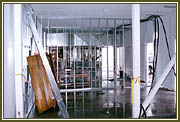 Electricians pulling cable feeders in the office building.